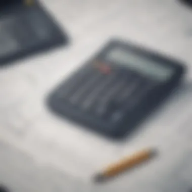 Close-up of insurance documents and a calculator